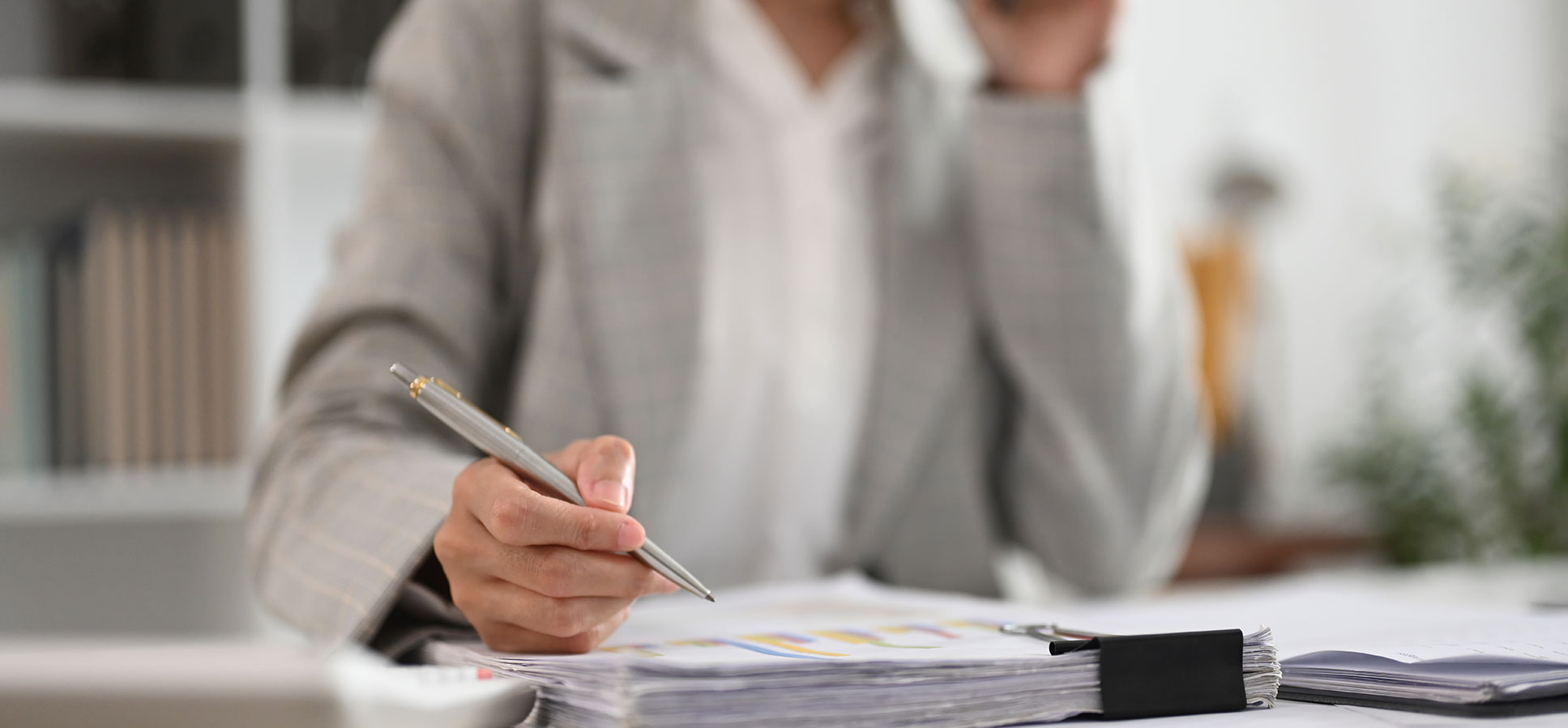 cropped-shot-businesswoman-having-cell-phone-conve-2024-12-05-22-01-39-utc